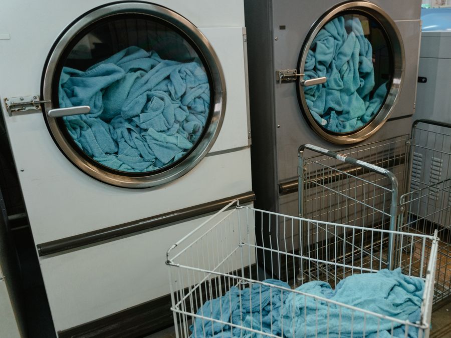 Freshly laundered towels folded and stacked ready to put away