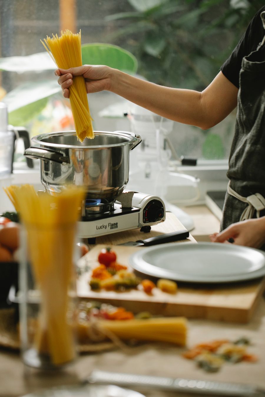 Fresh ingredients being prepared on a kitchen bench
